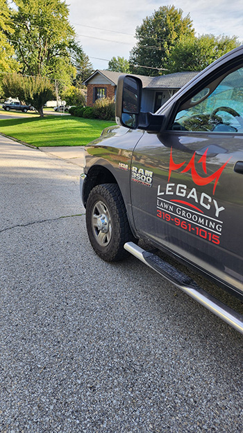 Legacy Lawn Grooming service vehicle